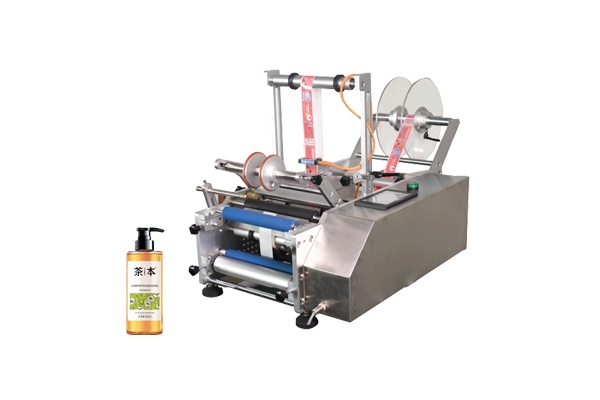 半自動沐浴露瓶貼標(biāo)機(jī)